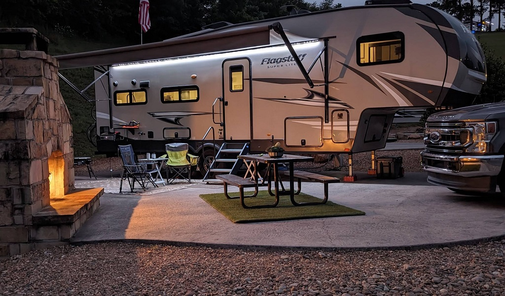 Anchor-Down-Resort-5.webp • Concrete RV pads and lake views at Anchor Down RV Resort.